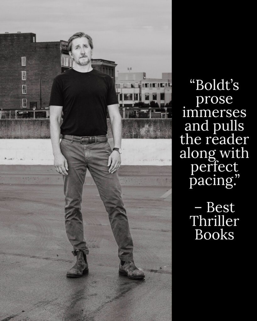 Josh Boldt standing in a rooftop parking lot.
